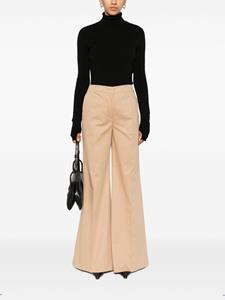 Moschino pressed-crease flared trousers - Beige