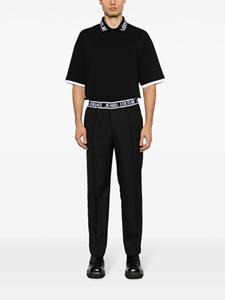 Versace Jeans Couture Poloshirt met logo - Zwart