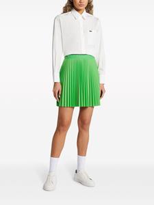 Lacoste logo-appliqué pleated mini tennis skirt - Groen