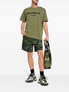 Balmain camouflage print distressed shorts - Groen