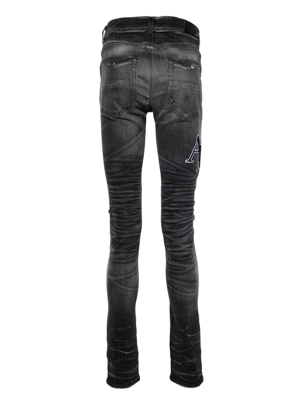 AMIRI embroidered-logo skinny jeans - Zwart