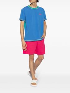 Moschino logo-embossed cotton beach shorts - Roze