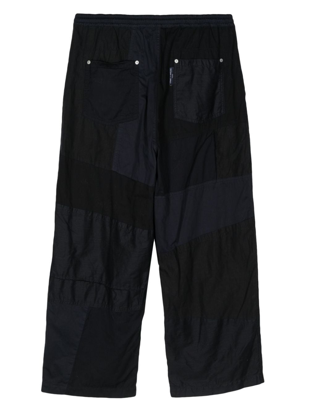Comme des Garçons Homme tapered patchwork trousers - Blauw