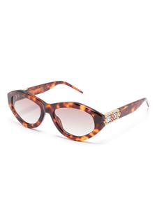 Casablanca monogram-plaque cat eye sunglasses - Bruin