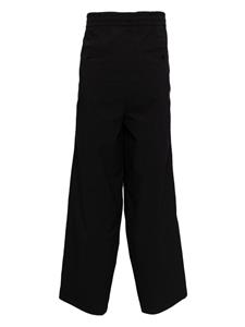 Yoshiokubo elasticated-waist drop-crotch trousers - Zwart