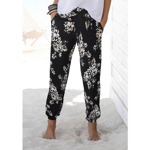 Lascana Strandbroek met subtiele bloemenprint, soepelvallende jersey broek, zomerbroek