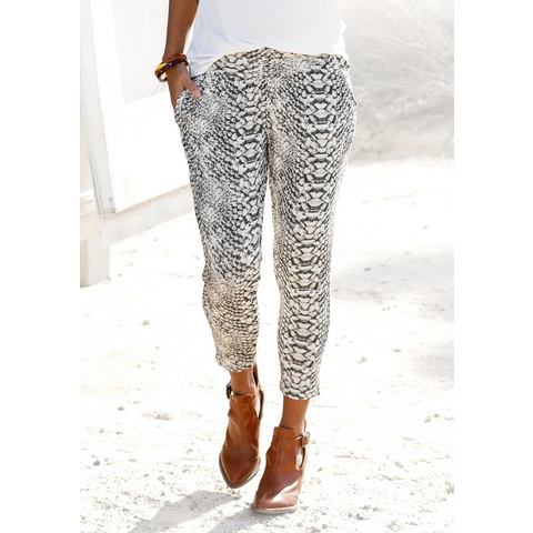 Lascana Strandbroek met all-over print in reptielen look en zakken, 7/8 lengte, jersey broek