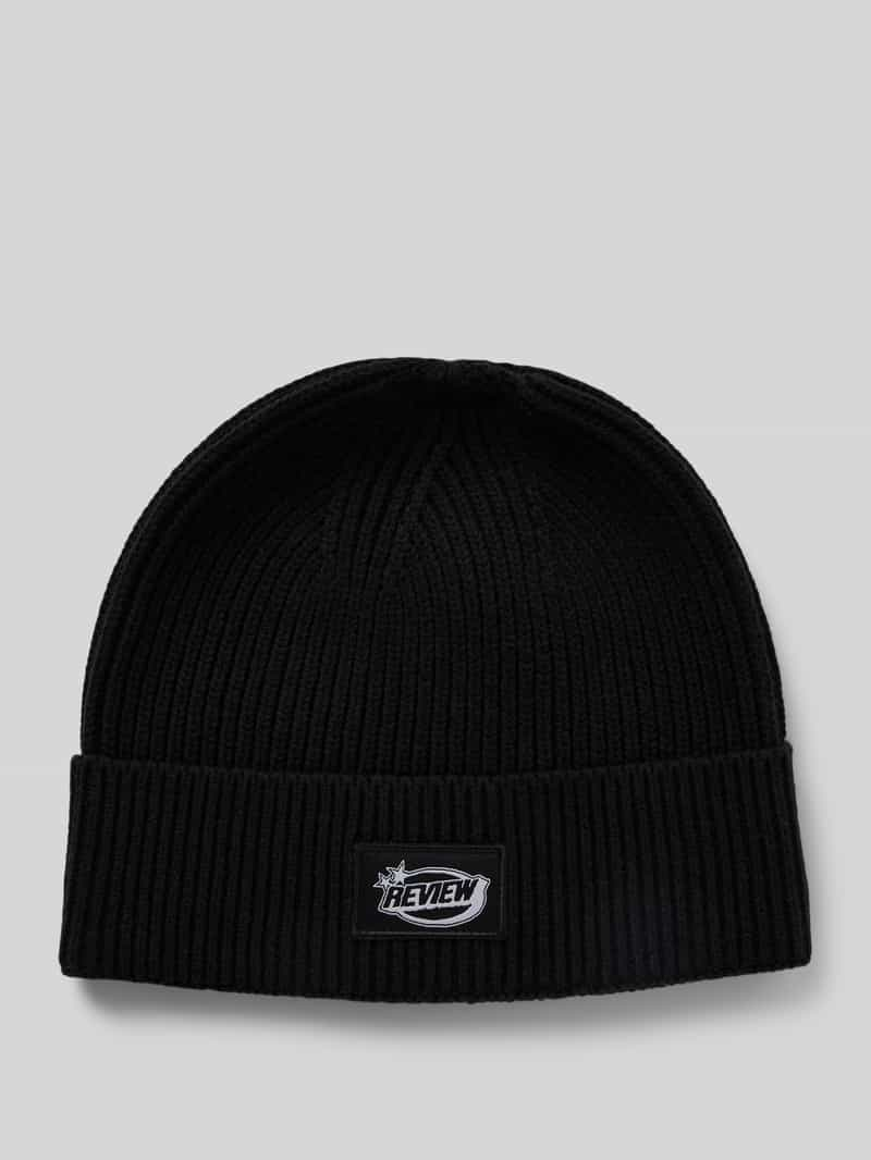 REVIEW Beanie met labeldetail