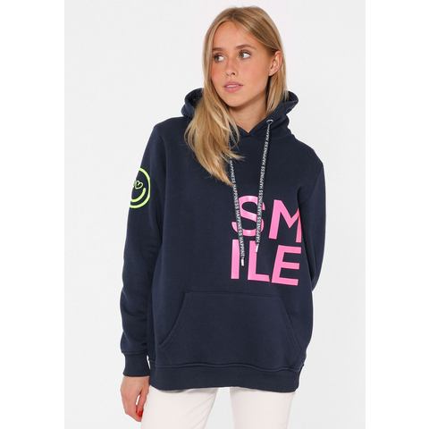 Zwillingsherz Hoodie met smile-opdruk in neonkleur en geborduurde smiley