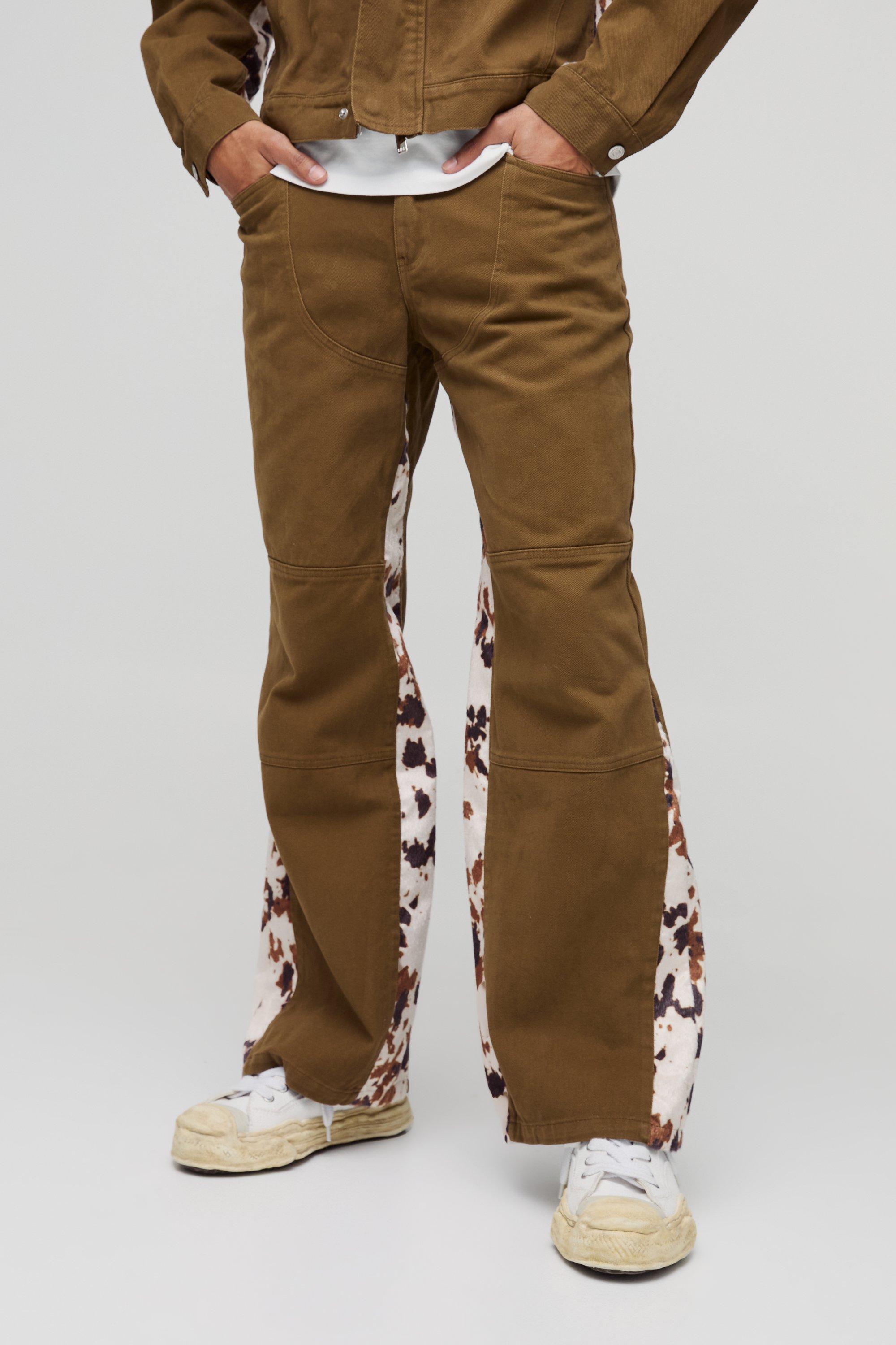 Boohoo Flared Flared Koeienprint Faux Fur Jeans Met Gusset Detail, Brown