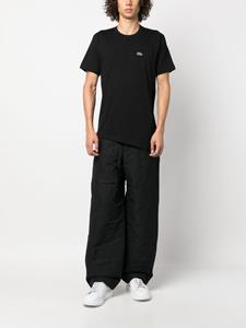 Comme Des Garçons Shirt x Lacoste asymmetric-hem T-shirt - Zwart