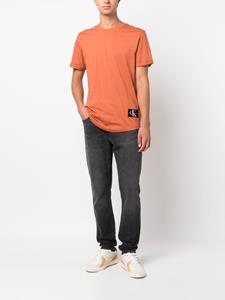 Calvin Klein Jeans T-shirt met logopatch - Oranje