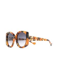 Gucci Eyewear Zonnebril met vlinder montuur - Bruin