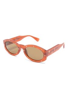 Moschino Eyewear Zonnebril met ovalen montuur - Oranje