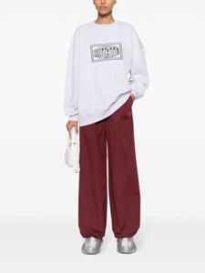 ROTATE logo-embroidered elasticated-waist palazzo trousers - Rood