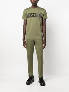 Moschino T-shirt met logoprint - Groen