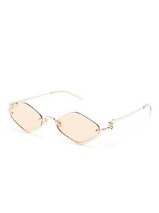 Gucci Eyewear Zonnebril met geometrisch montuur - Goud