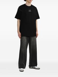 Izzue slogan-print cotton T-shirt - Zwart