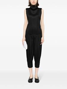 Pleats Please Issey Miyake tapered pleated trousers - Zwart