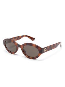 Gucci Eyewear Zonnebril met ovalen montuur - Bruin