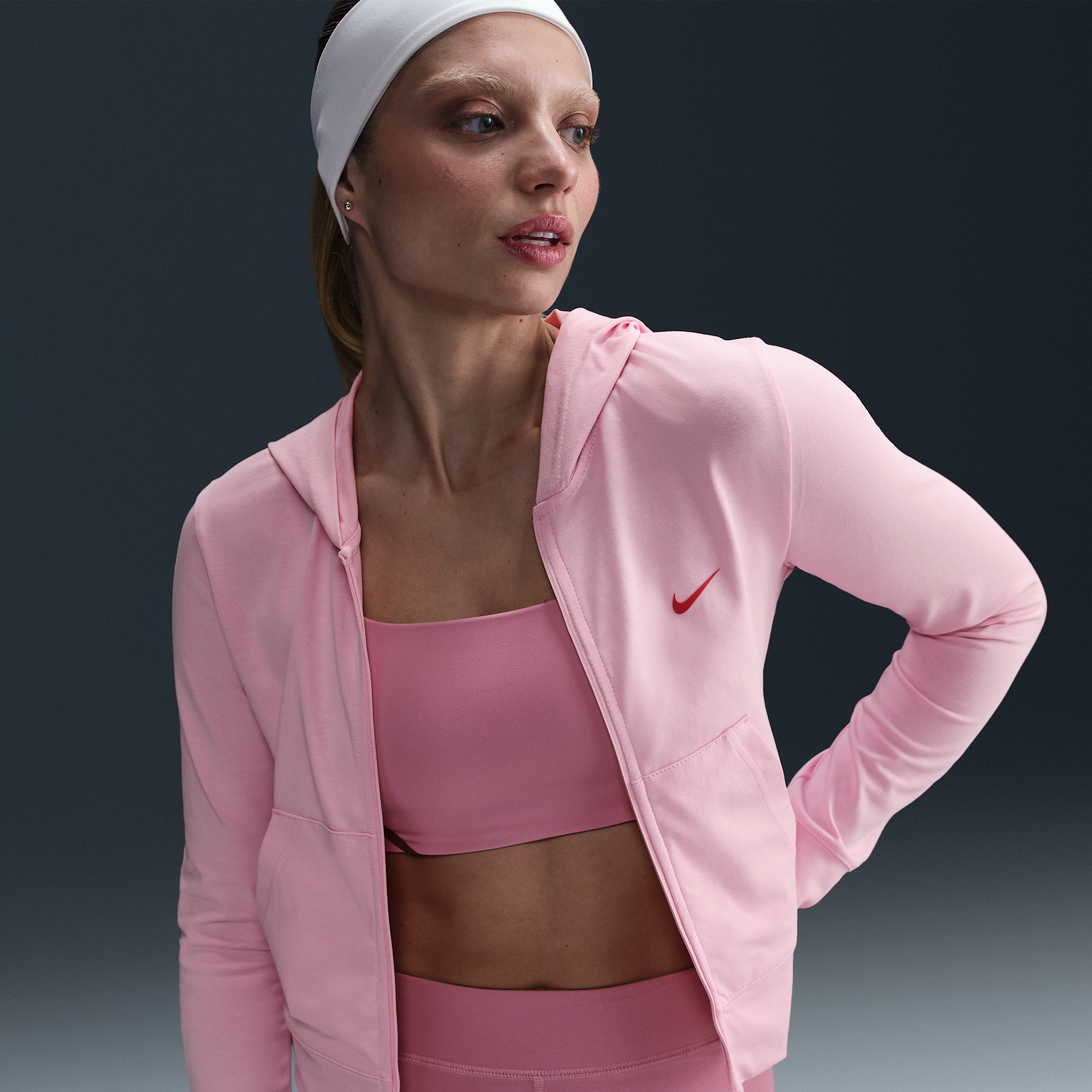 Nike Sportswear damestop met rits over de hele lengte, capuchon en lange mouwen - Roze
