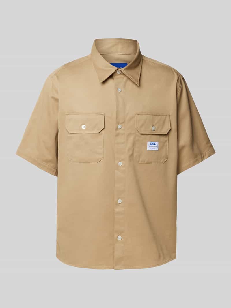 OTTO HUGO Blue Overhemd met korte mouwen Ekyno met contrasterend logo-badge op de borst