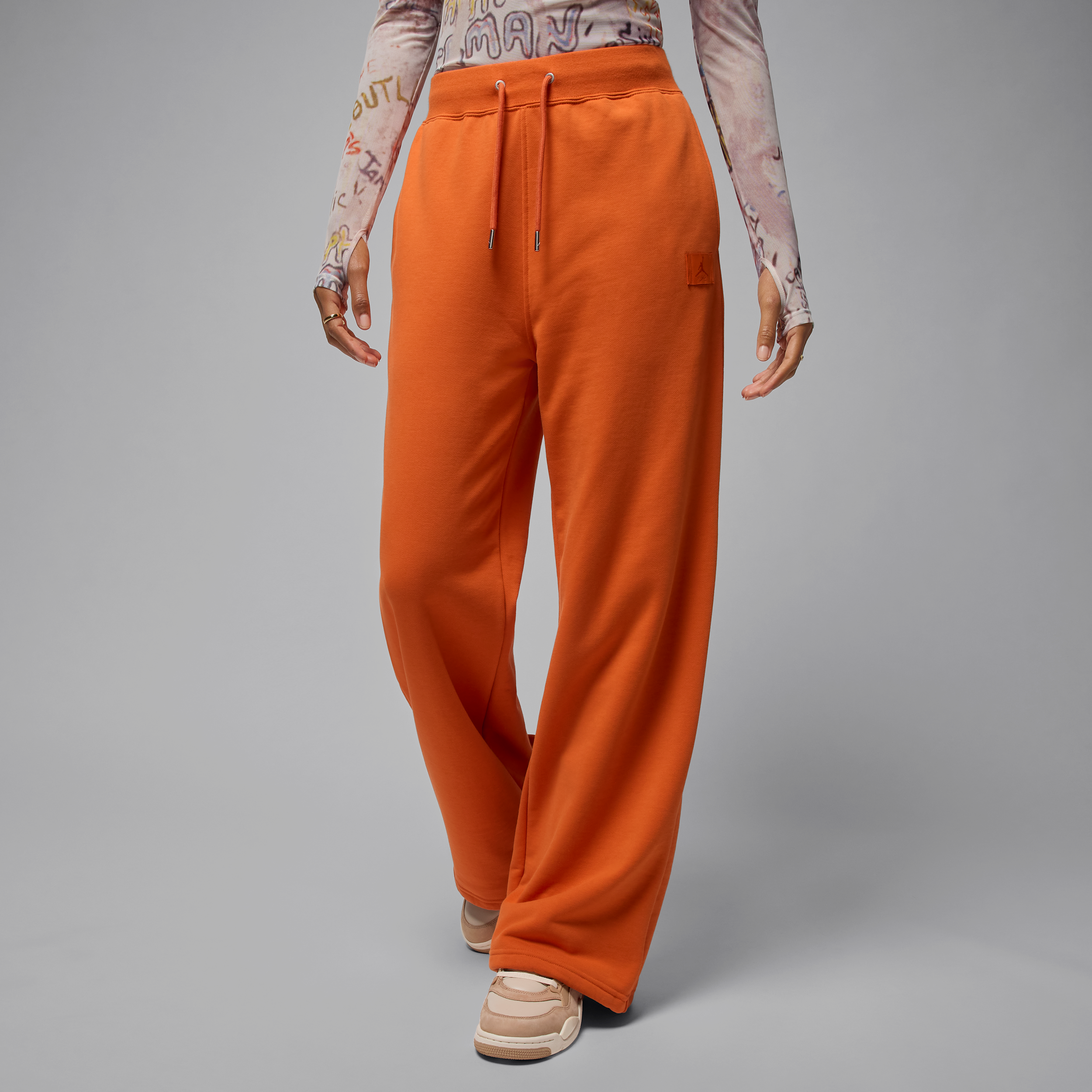 Jordan Flight Fleece damesbroek van sweatstof met open zoom - Oranje
