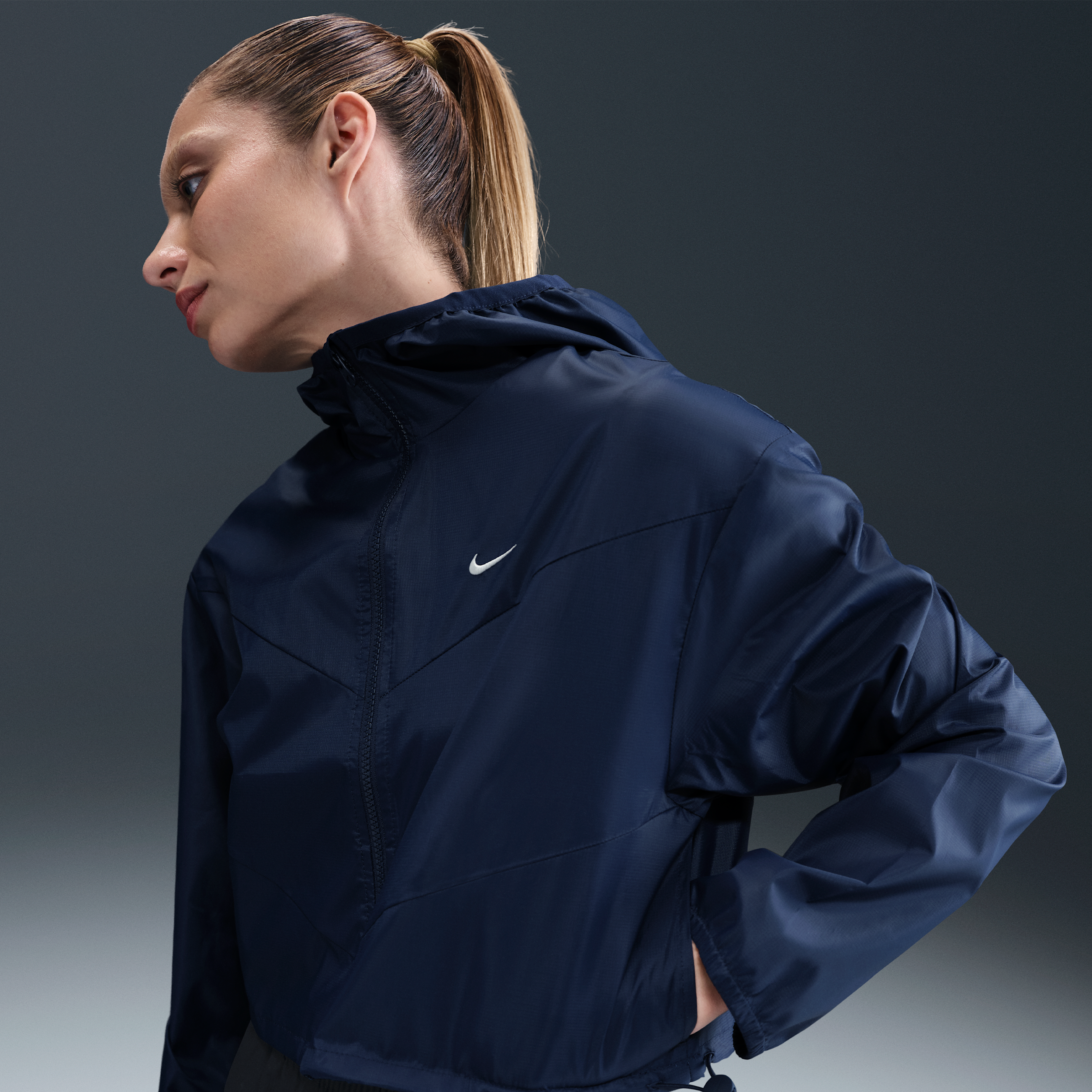 Nike Sportswear Windrunner ruimvallend geweven damesjack met capuchon - Blauw