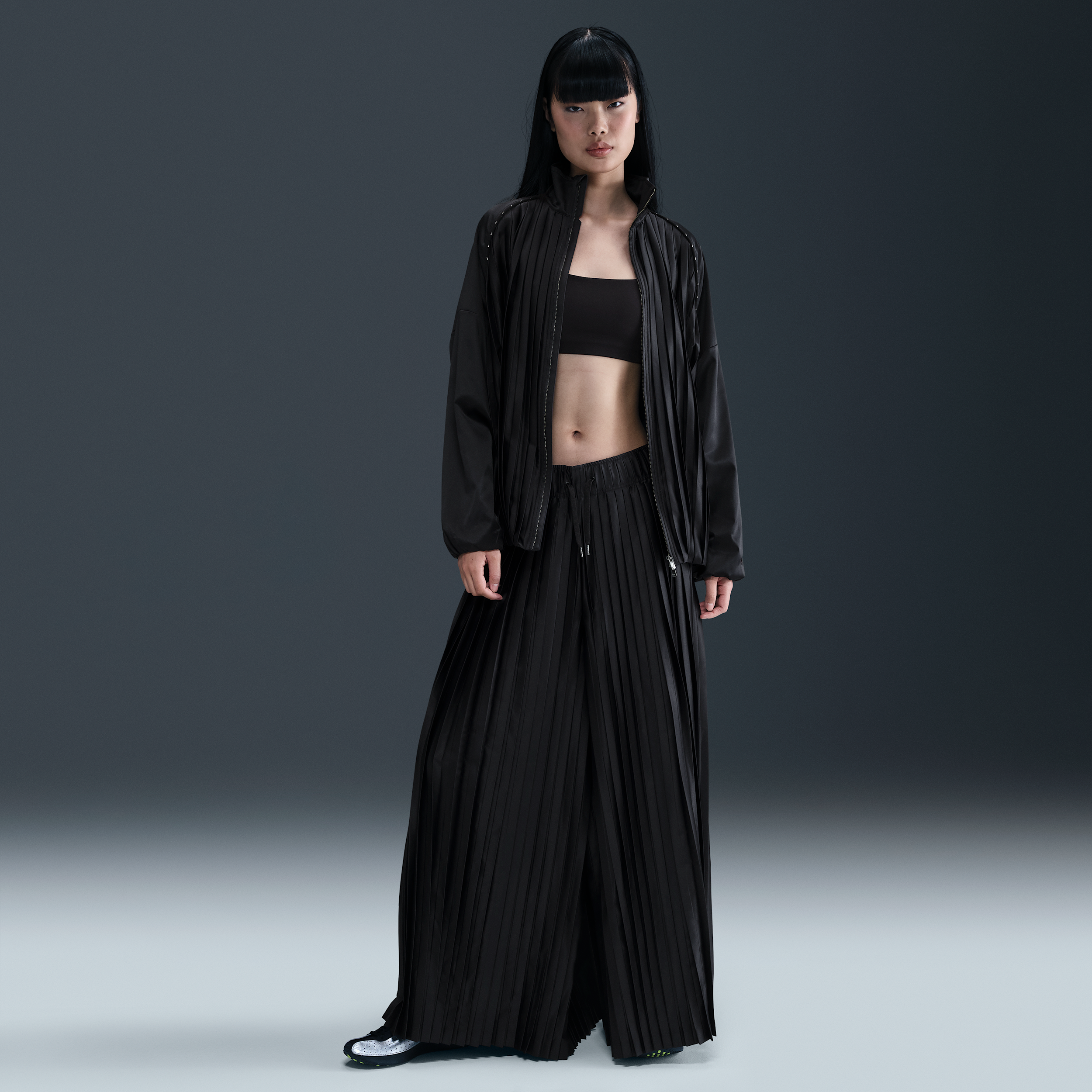 Nike Sportswear Collection trainingsbroek met plooien en halfhoge taille voor dames - Zwart