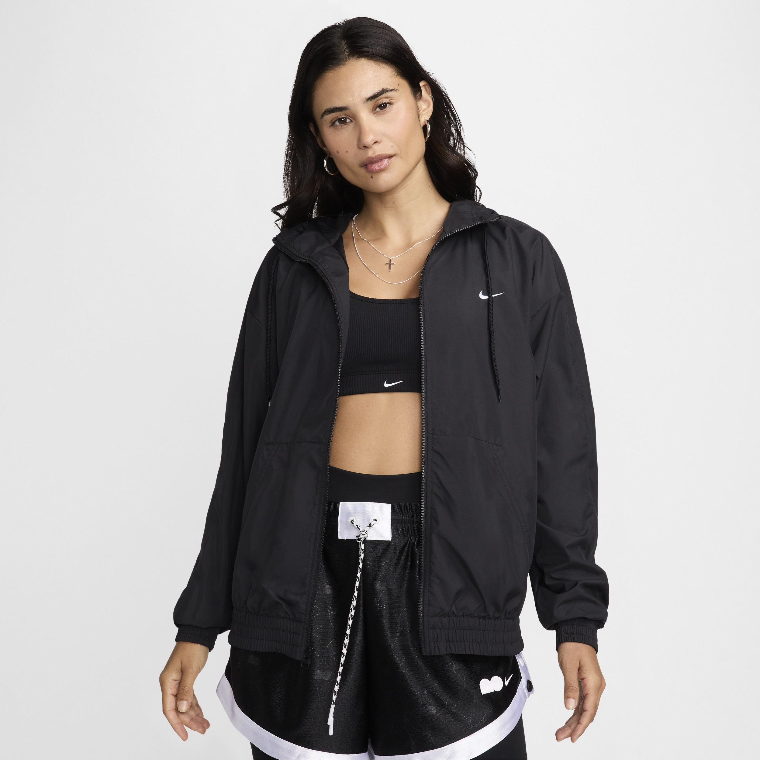 Nike Sportswear Classic Wovens ruimvallend UV-damesjack met capuchon - Zwart
