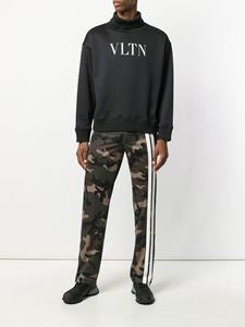 Valentino Camouflage track pants with Contrasting Side Bands - Groen