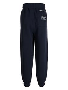 Izzue logo-embroidered jersey track pants - Blauw