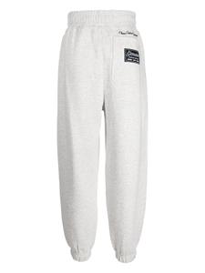 Izzue high-waisted logo-patch tapered track pants - Grijs