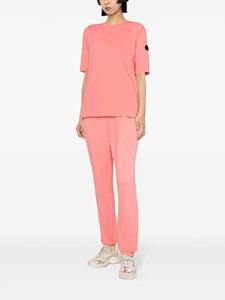 Moncler high-waisted logo-embossed track pants - Roze