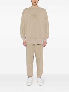 Calvin Klein logo-embroidered track pants - Beige