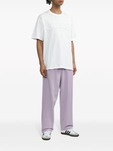 Izzue logo-embroidery cotton track pants - Paars