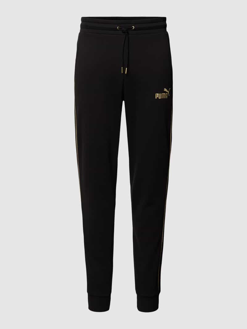 PUMA PERFORMANCE Sweatpants met labelstitching