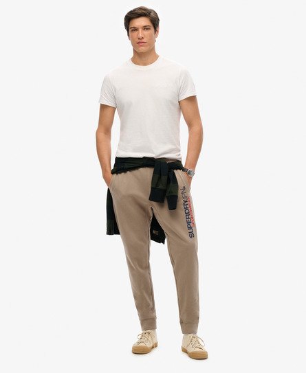 Superdry Mannen Taps Toelopende Joggingbroek met Sportswear-logo Beige