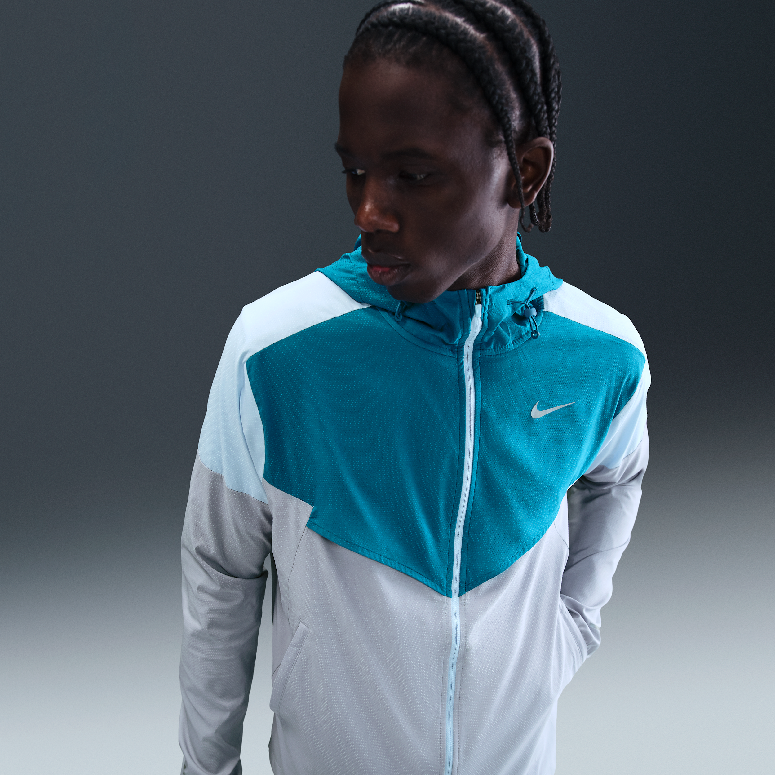 Nike Impossibly Light Windrunner hardloopjack voor heren - Blauw