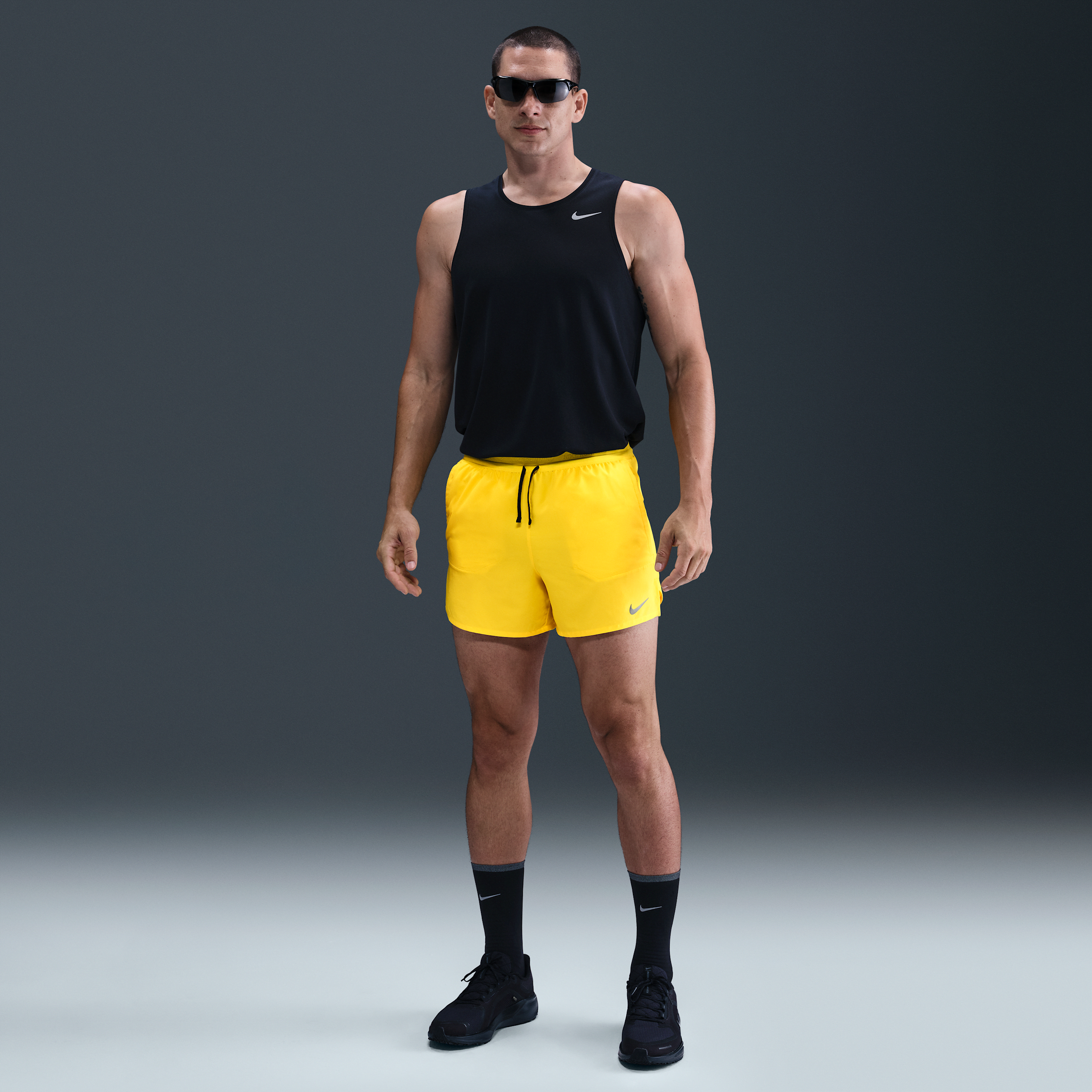 Nike Stride Dri-FIT hardloopshorts met binnenbroek voor heren (13 cm) - Geel