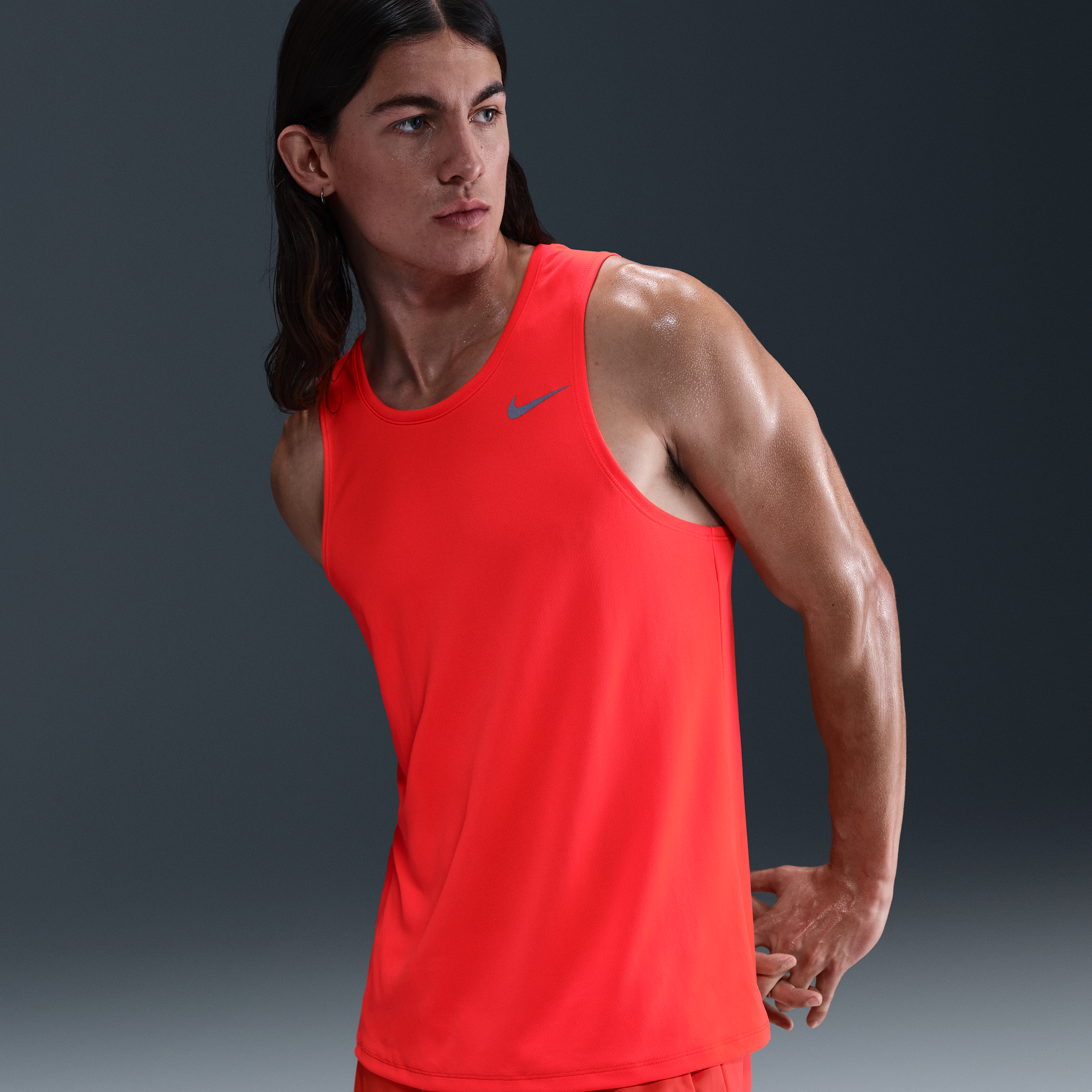 Nike Miler hardlooptanktop met Dri-FIT voor heren - Rood