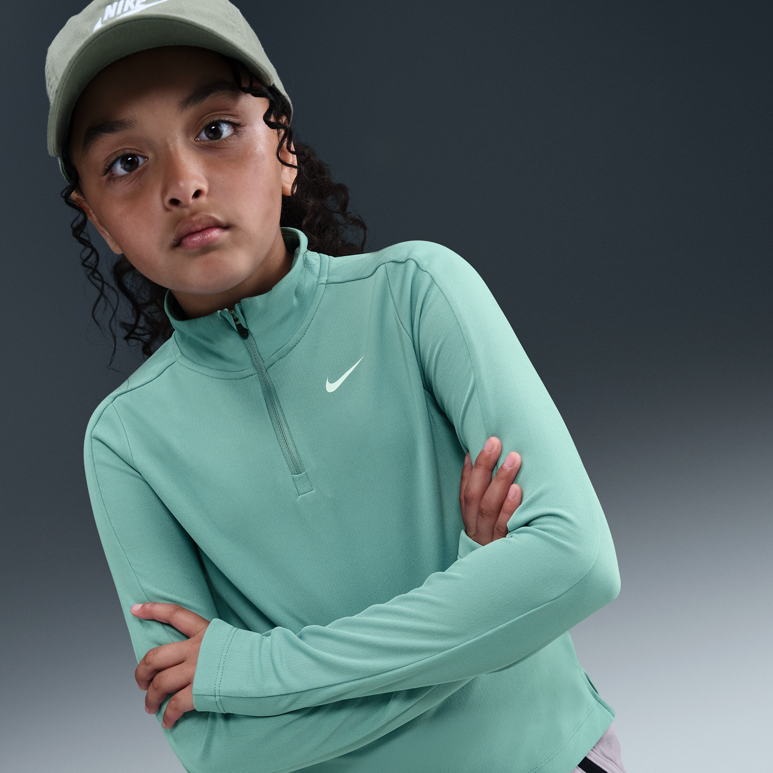 Nike Dri-FIT meisjestop met lange mouwen en korte rits - Groen