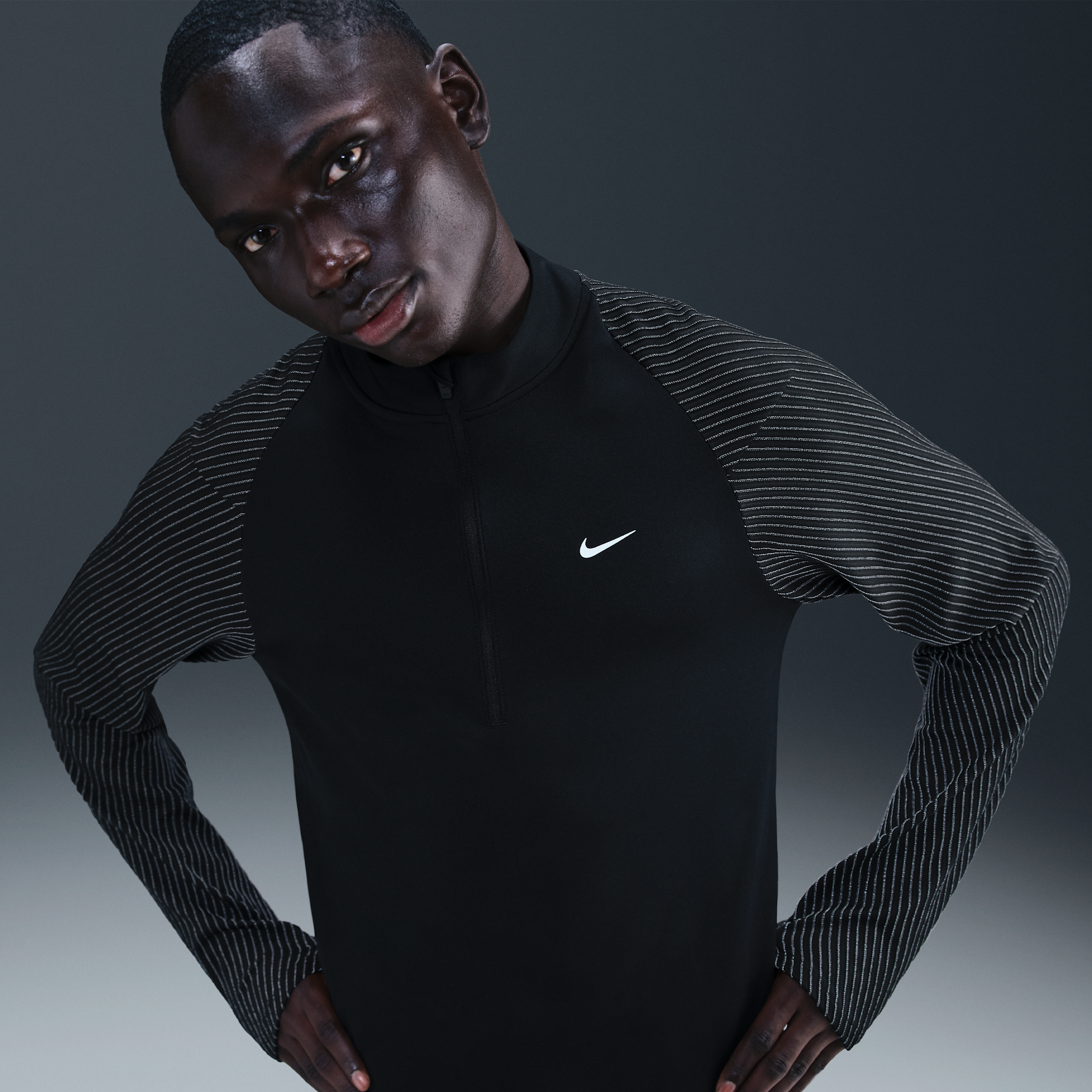 Nike Dri-FIT hardlooptop met halflange rits en reflecterend design voor heren - Zwart