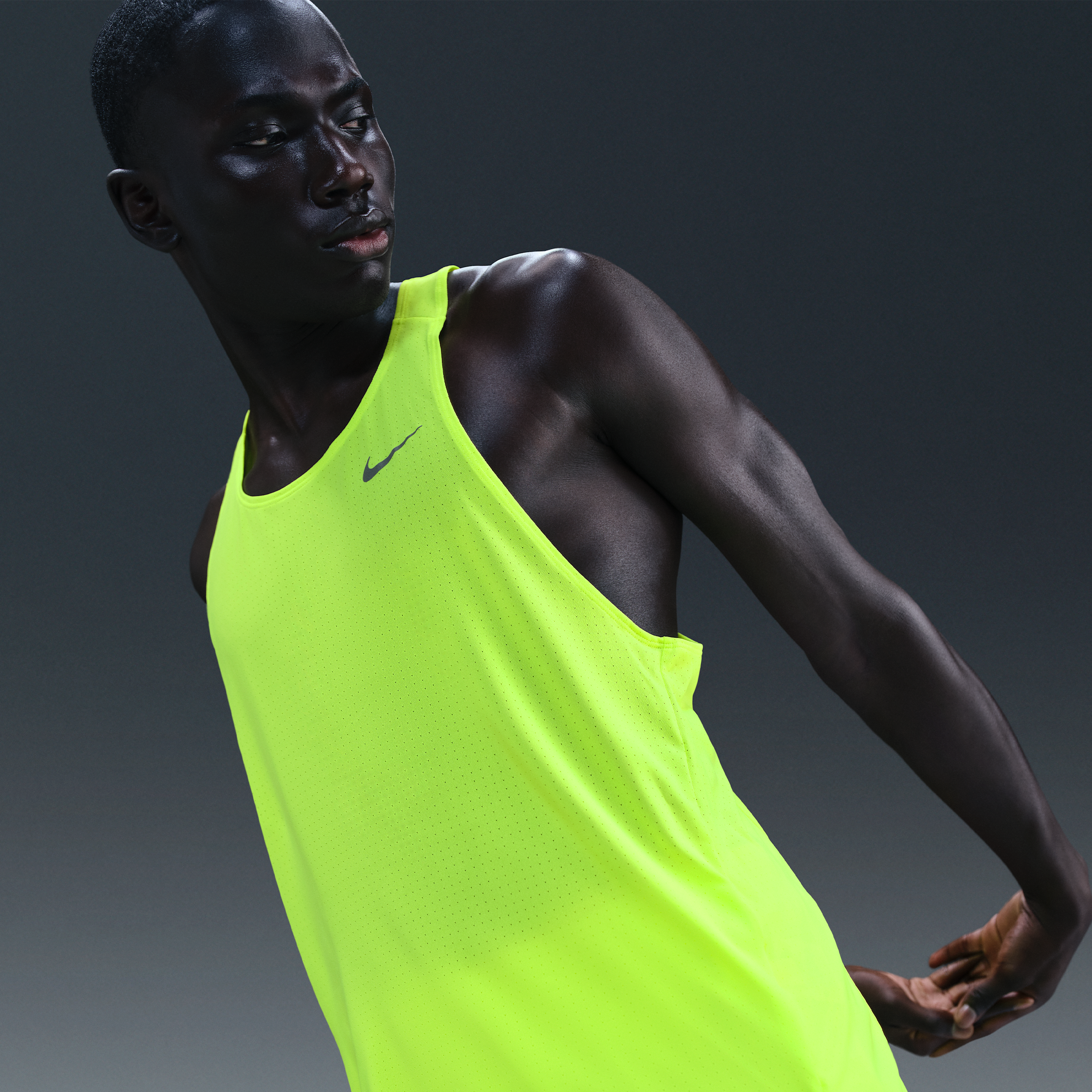 Nike Fast hardloopsinglet met Dri-FIT voor heren - Geel