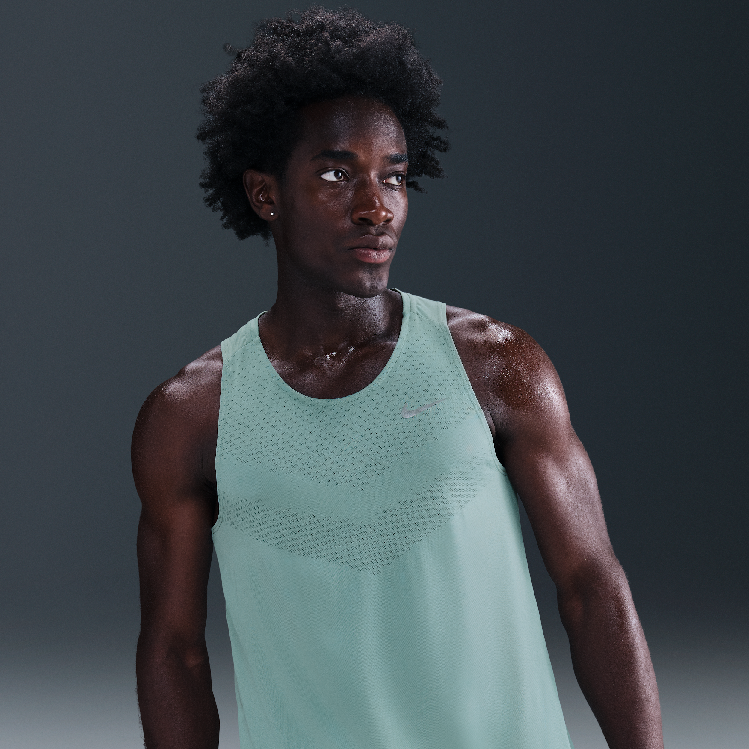 Nike Stride Dri-FIT ADV hardlooptanktop voor heren - Groen