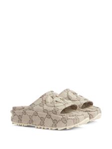 Gucci Slippers met G-print - Beige