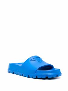 Prada Slippers met logo-reliëf - Blauw