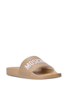 Moschino logo-embossed moulded-footbed slides - Beige