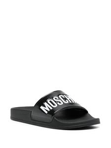 Moschino Slippers met logo-reliëf - Zwart