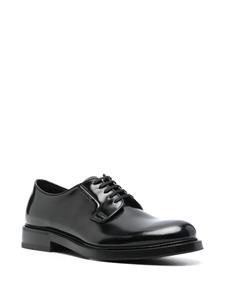 Prada Leren Oxford schoenen met logo-reliëf - Zwart